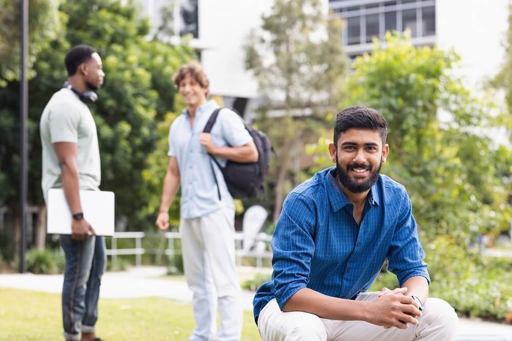 smiling international students in Australia who took their taxes back